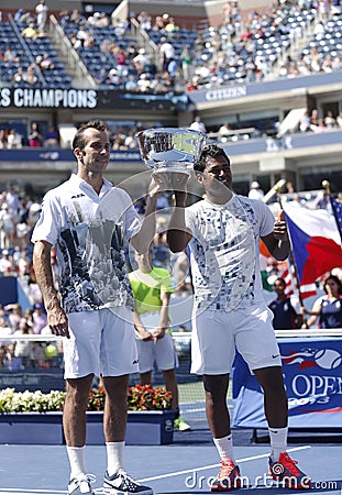 US Open 2013 men doubles champions Radek Stepanek from Czech Republic and Leander Paes from India during trophy presentation