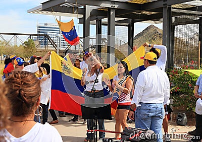 USA, AZ: Rally For Venezuela >Woman Cheering Crowd