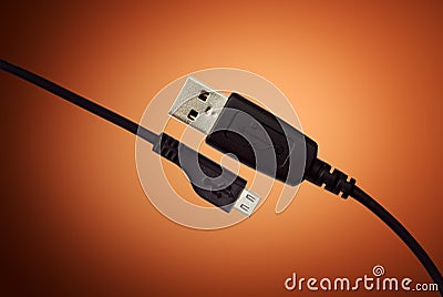 USB Cable on orange background