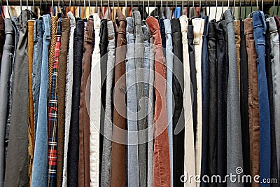 Stock Image: Used clothing on thrift store rack