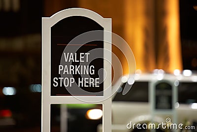 Valet parking - stop here sign