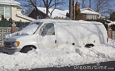 Van under snow in Brooklyn after massive winter storms strikes Northeast