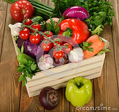 Various vegetables in a wooden box