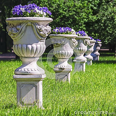 Vases with flowers in the park