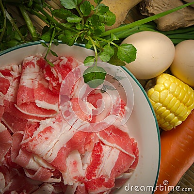 Vegetables ingredient and fat beef slices