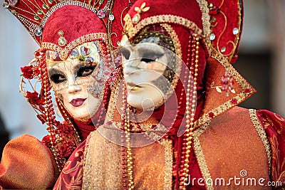 VENICE, ITALY - FEBRUARY 8: Unidentified people in Venetian mask