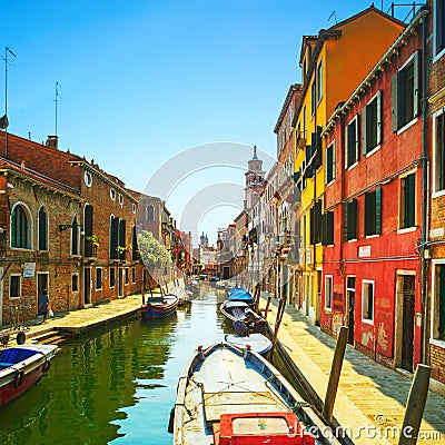 Venice San Barnaba cityscape, water canal, church and boats. Ita