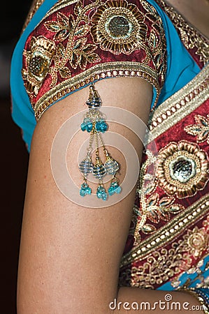 Vertical Close-up of Hindu Brides Jewelry & Dress