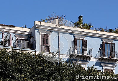 Very well restored facade of an old building with terrace