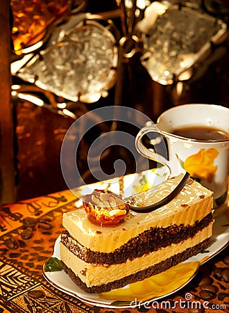 Vienna cake with almond and caramel in cafe