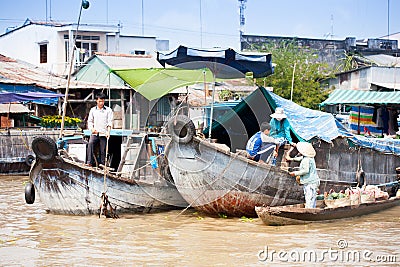 VIETNAM - JAN 28: boats at floating market on Jan 28, 2014.fam