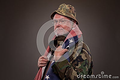 Vietnam Veteran with American flag