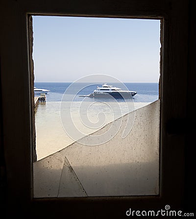 View of boat through broken window