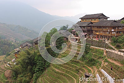 View with Dragon Ridge Terrace of rice fields and wood house