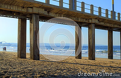 View Through A Pier in Late Afternoon on Golden Mile Beach, Durban, South Africa