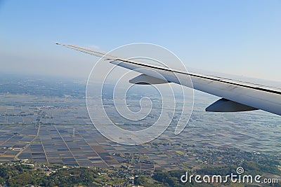 View from a plane on wing and on rural