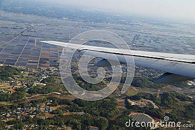 View from a plane on wing and on rural