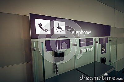 View of telephones in airport terminal