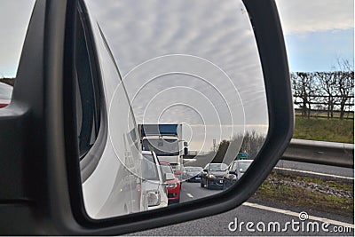View of traffic from rear view mirror