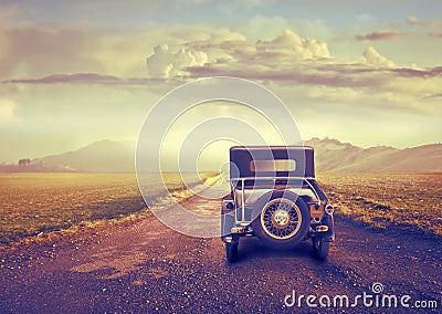 Vintage Car on a Desert Road