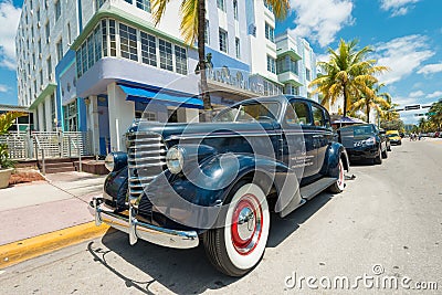 Vintage car parked at Ocean Drive in South Beach, Miami