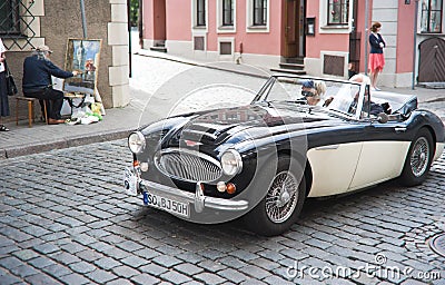 Vintage car in street of old Riga center