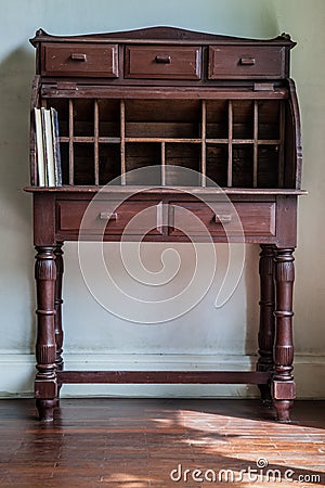 Vintage desk in a room with wooden floor