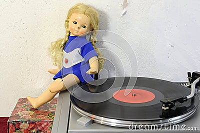 Vintage doll and turntable