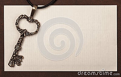 Vintage key and paper texture background with space for your tex