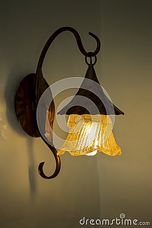 Vintage lantern on a wall.