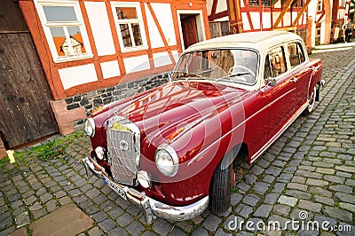 Vintage old model of red Mercedes car