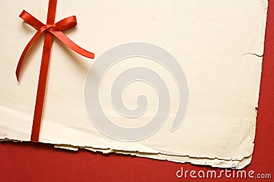 Vintage paper with red bow