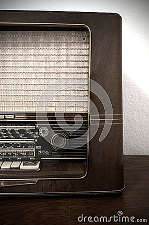 Vintage radio on wooden dresser