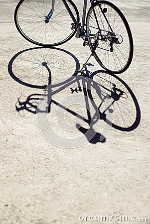 Vintage road bicycle and its shadow