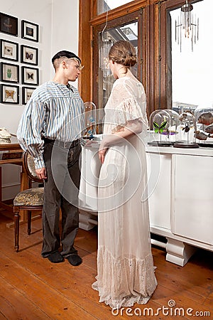Vintage sailor and girl in victorian dress
