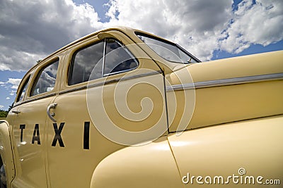 Vintage Taxi Cab in pale yellow