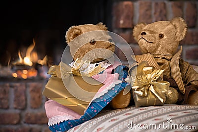 Vintage teddy bears in front of fireplace