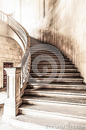 Vintage view of marble spiral staircase.