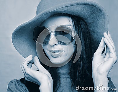 Vintage woman in sunglasses and hat