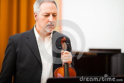 Violinist reading the score