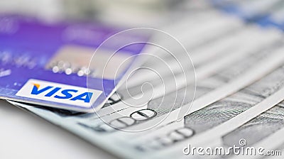 Visa Debit Cards Over Dollar bills