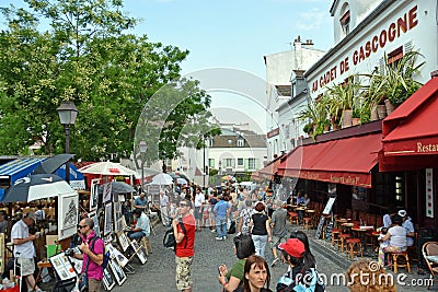 Visitors at an Art Market in Montmatre, Paris France.