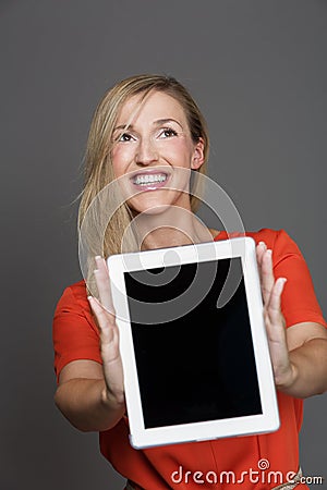 Vivacious joyful woman with a tablet computer