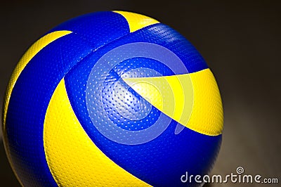Volleyball on hardwood floor