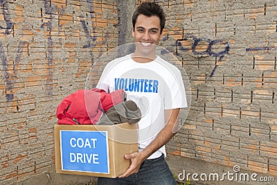 Volunteer with coat drive donation box