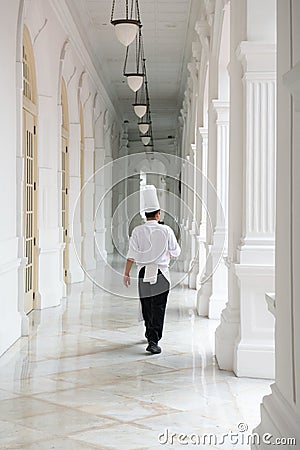 Waiter in uniform in the Raffles Hotel
