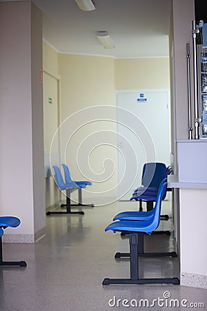 Waiting room blue chairs door