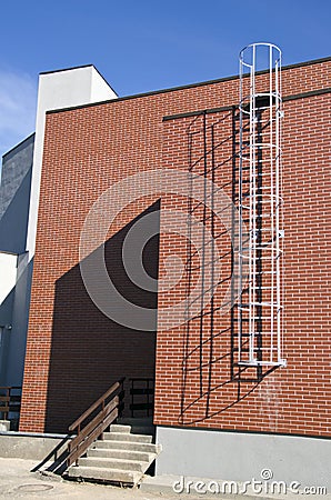 Wall with metal ladder