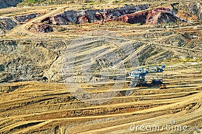 The wall surface mine with exposed colored minerals