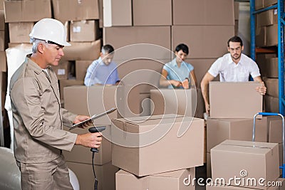 Warehouse workers preparing a shipment